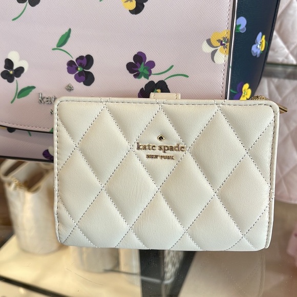 Kate Spade Carey Medium Compartment Bifold Wallet 
COLOR: Parchment - Picture 8 of 16